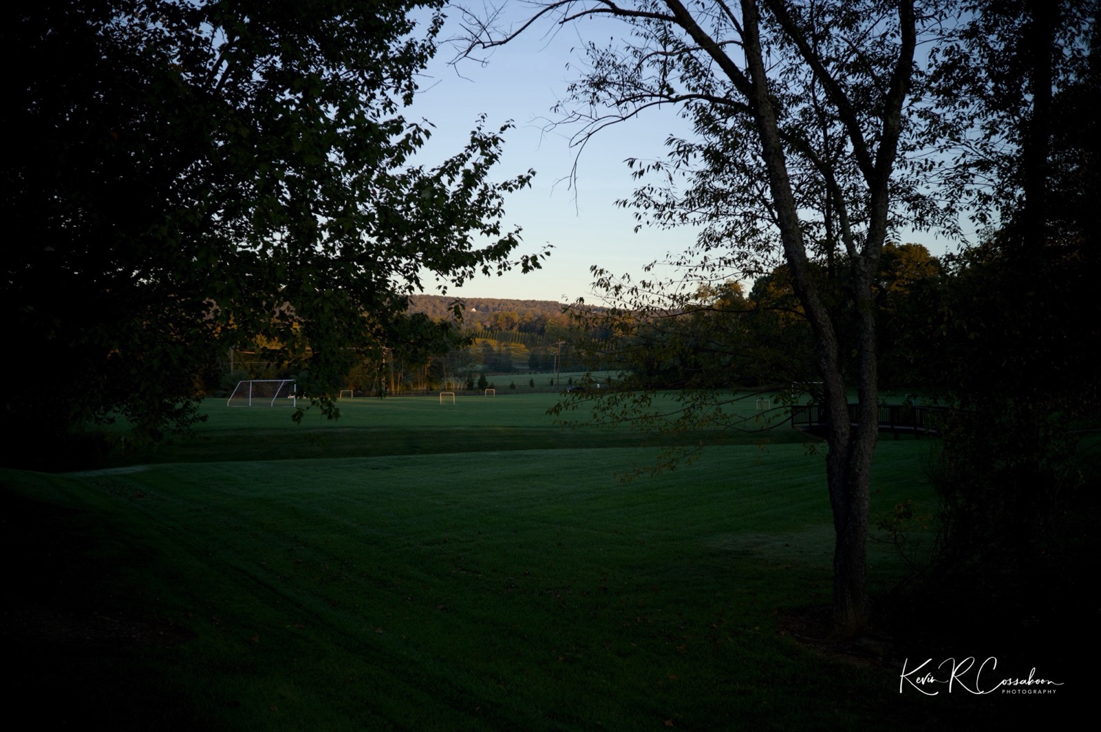 Soccer fields in early morning shade